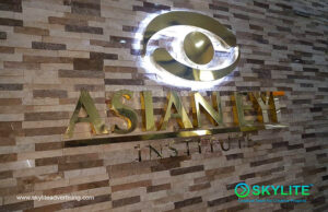 asian eye institute brass sign 1