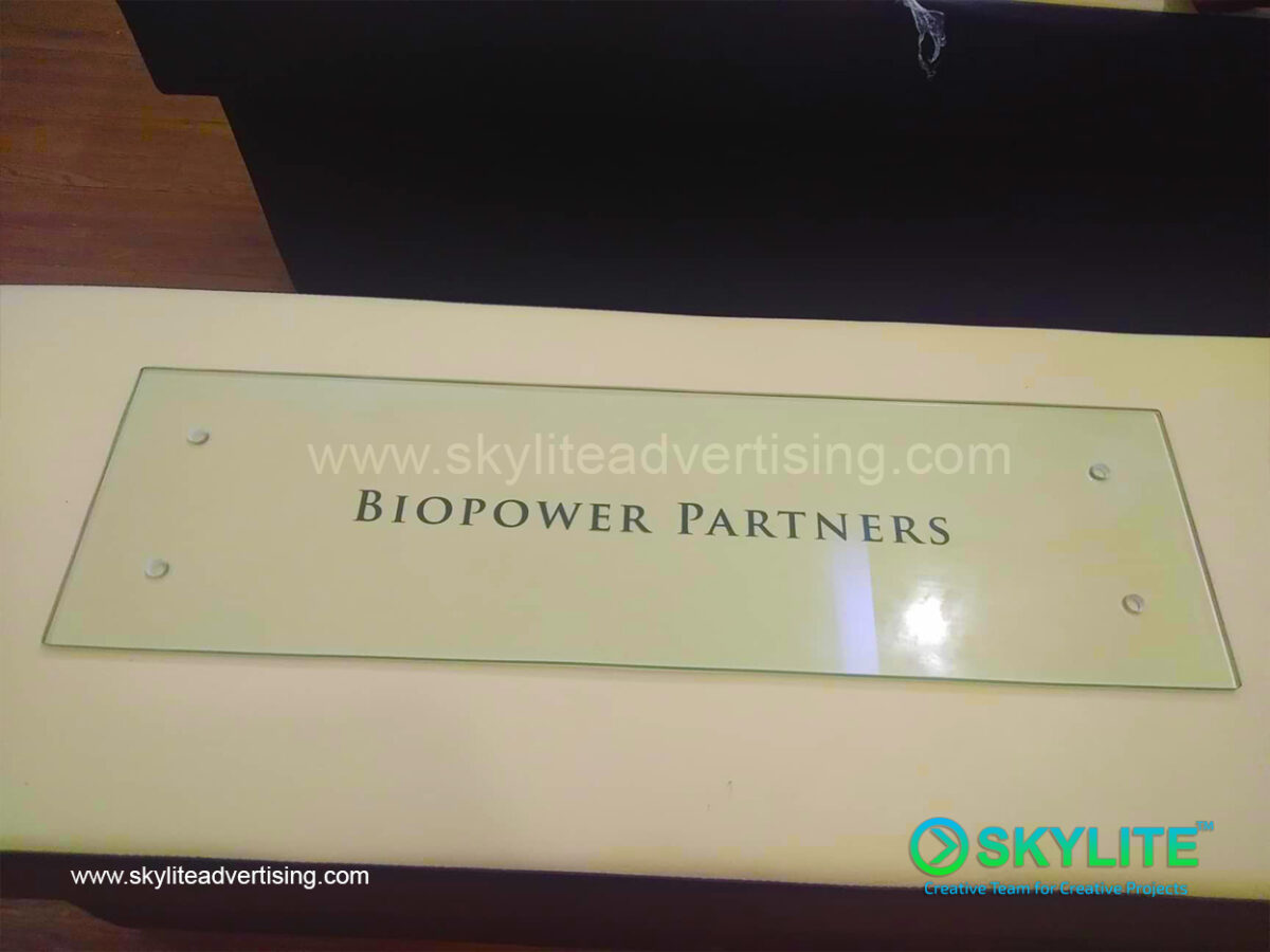ayala group of companies biopower direct printed on glass sign 1