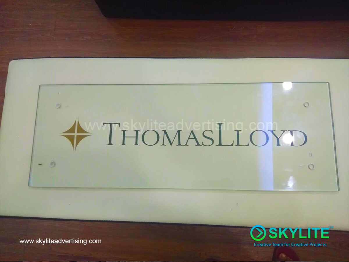 ayala group of companies thomas lloyd direct printed on glass sign 1
