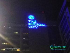 installation of the medical city stainless sign 6 1