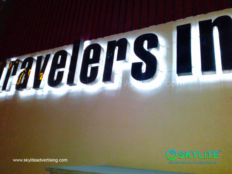 travelers in makati ave stainless sign 1 1
