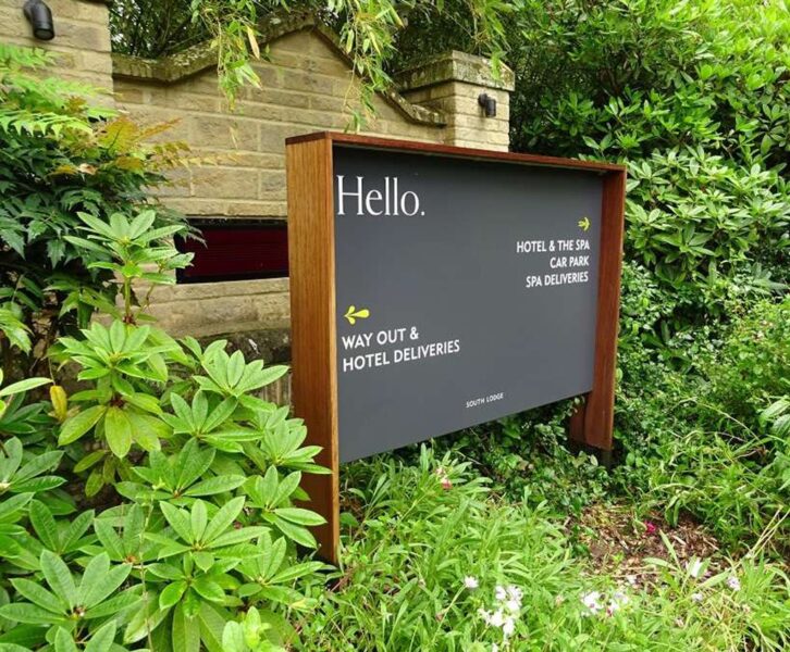 Metal Directional Sign with Wooden Frame and Stand